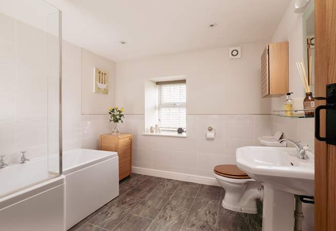 Bedroom 1 has it's own large bathroom, there is a shower over the bath for your comfort.