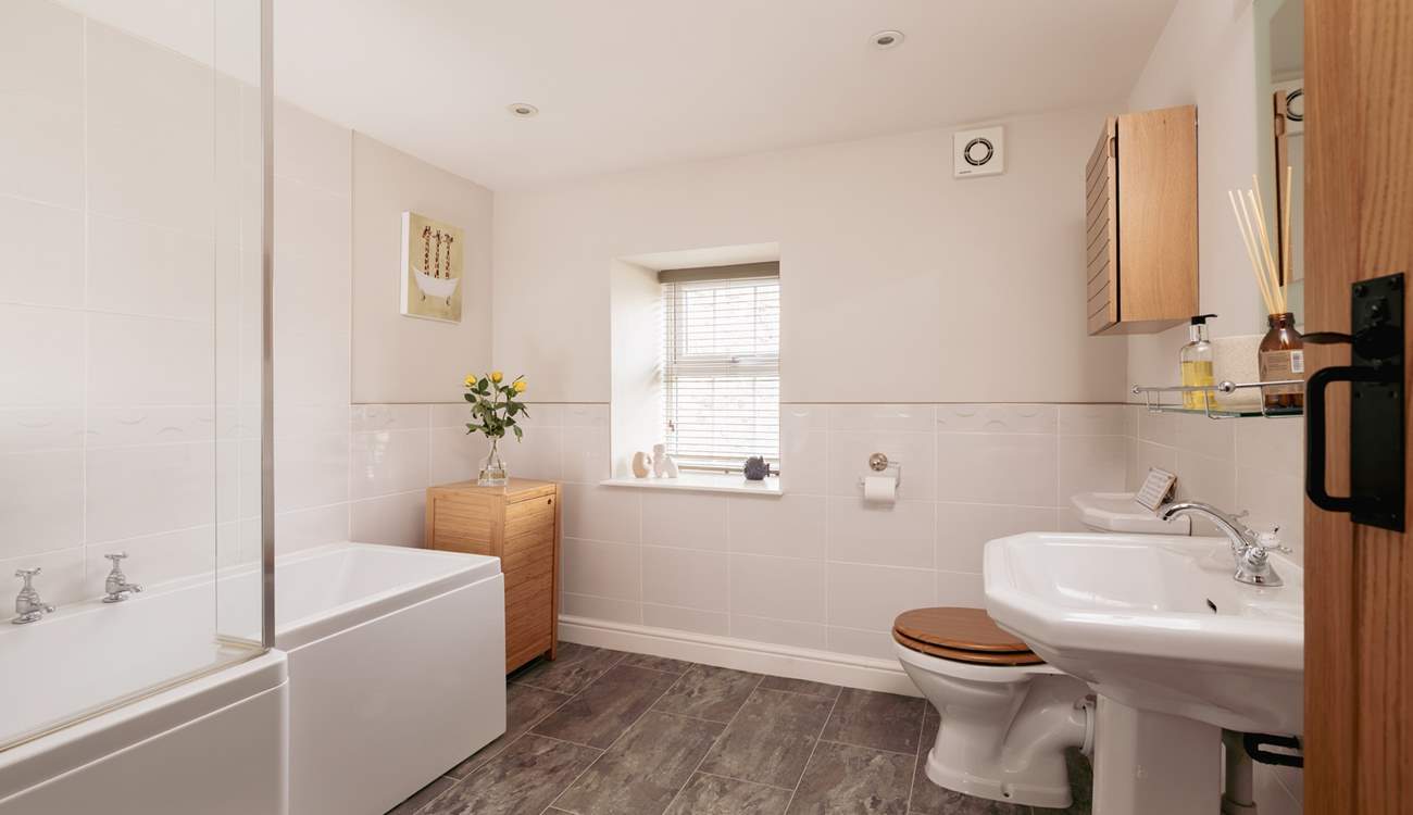 Bedroom 1 has it's own large bathroom, there is a shower over the bath for your comfort.