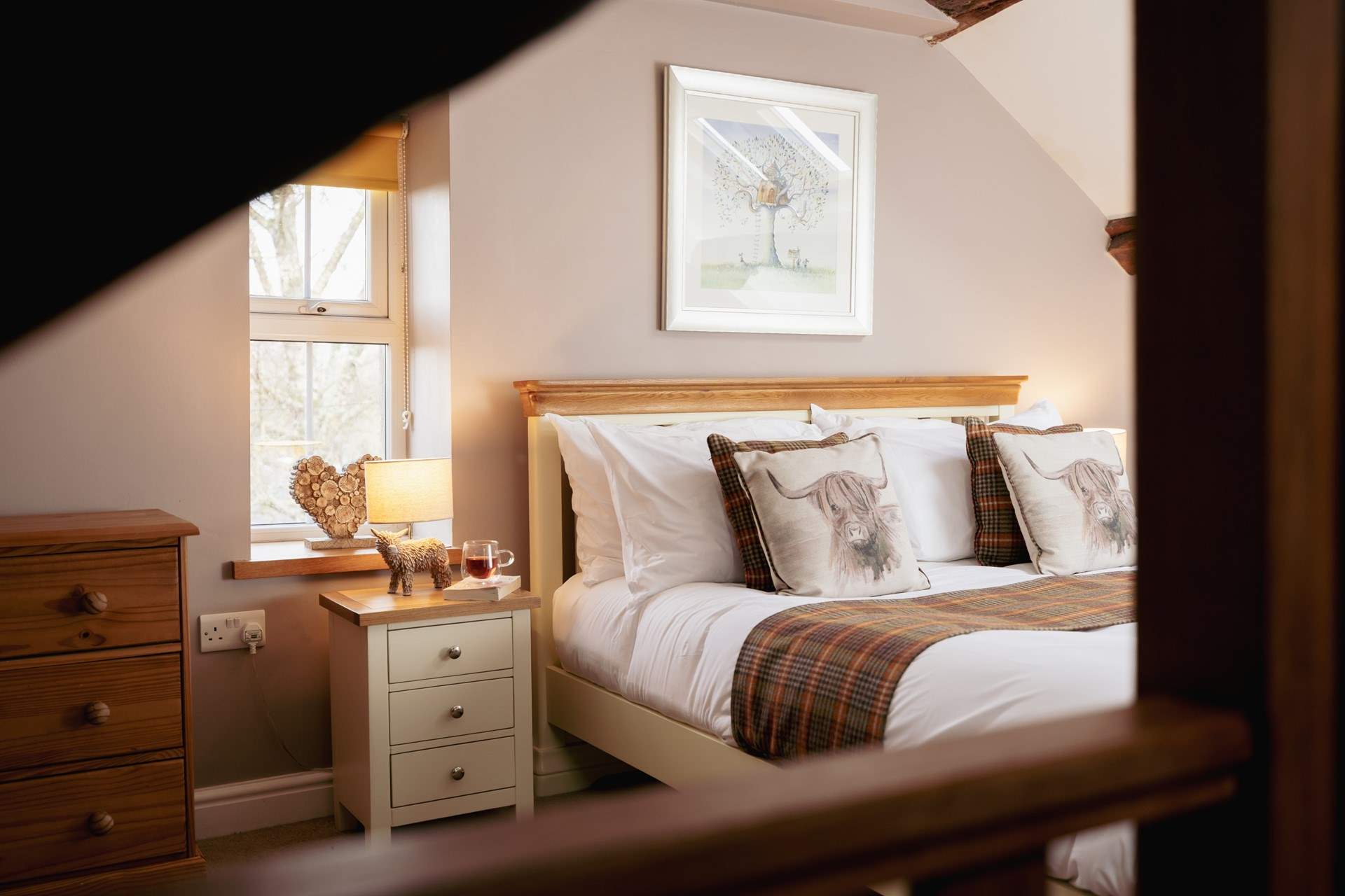 Bedroom 2 has a king-size bed, an en suite and amazing views.