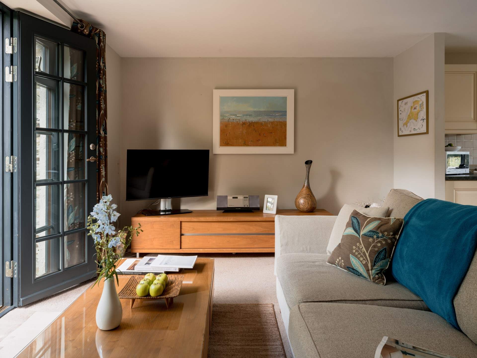 The living-room invites laid-back evenings and movie nights.