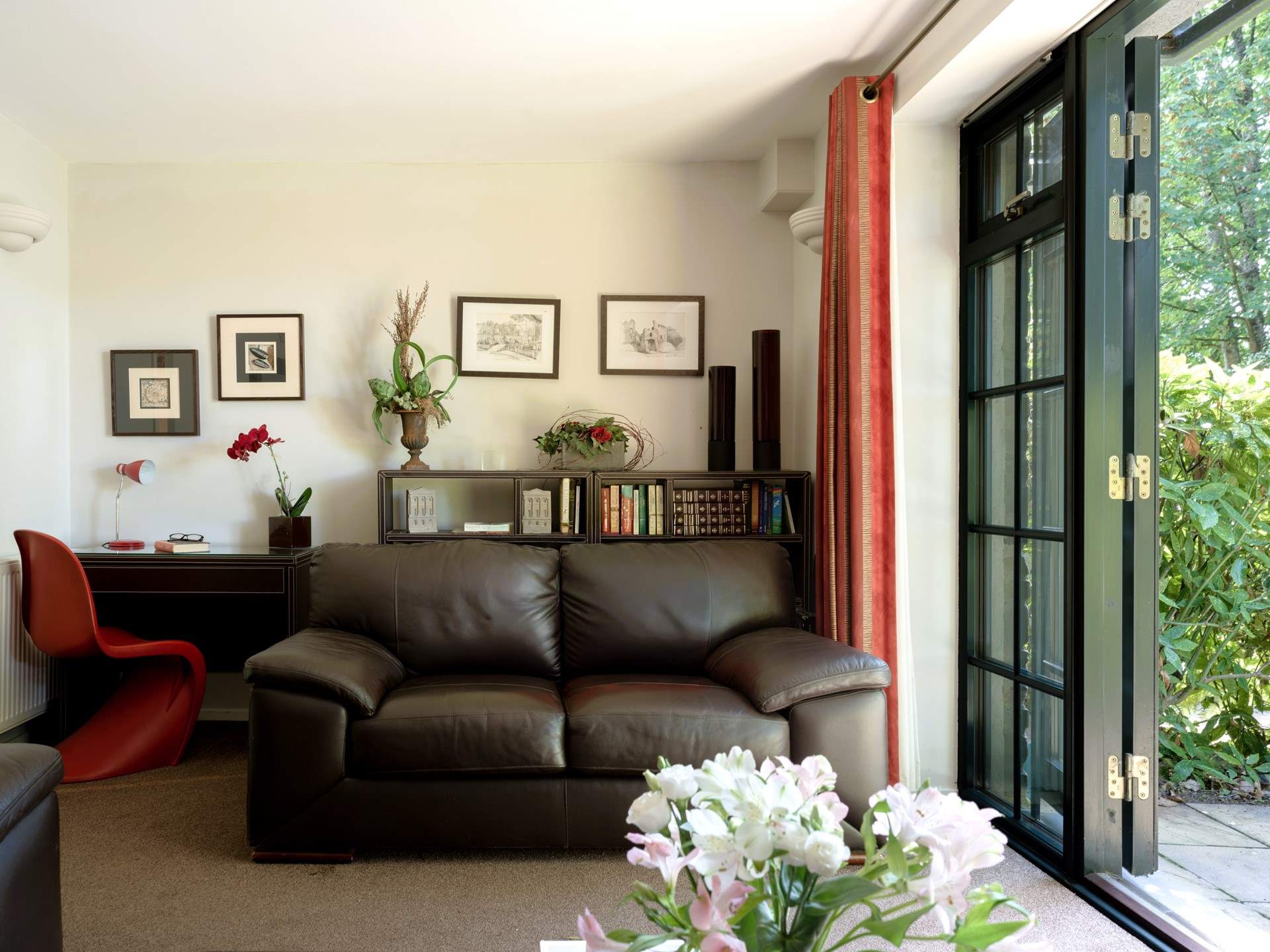 There's also a sitting-room on the ground floor, leading out to the terrace.