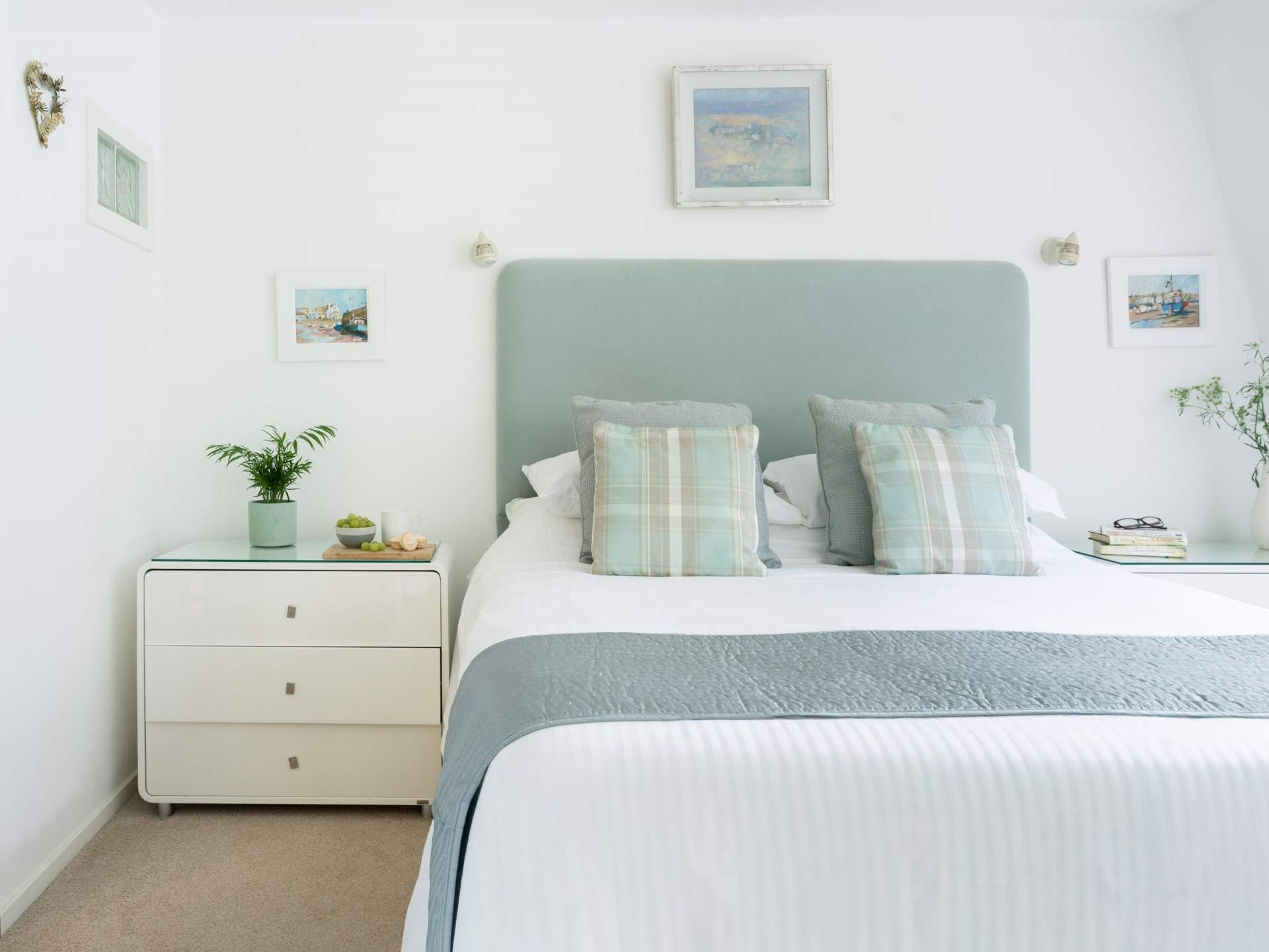 A comfy king-size bed awaits in bedroom 1.