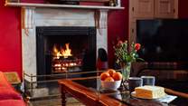 Curl up in front of the fire and enjoy holiday treats.