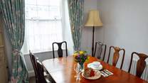 Gather around the dining-room table for unhurried holiday meals and fun board games. 