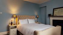 Ornate, ornamental, original fireplaces adorn the three bedrooms. 