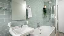 Take a shower or a bath in the family bathroom on the first floor. 
