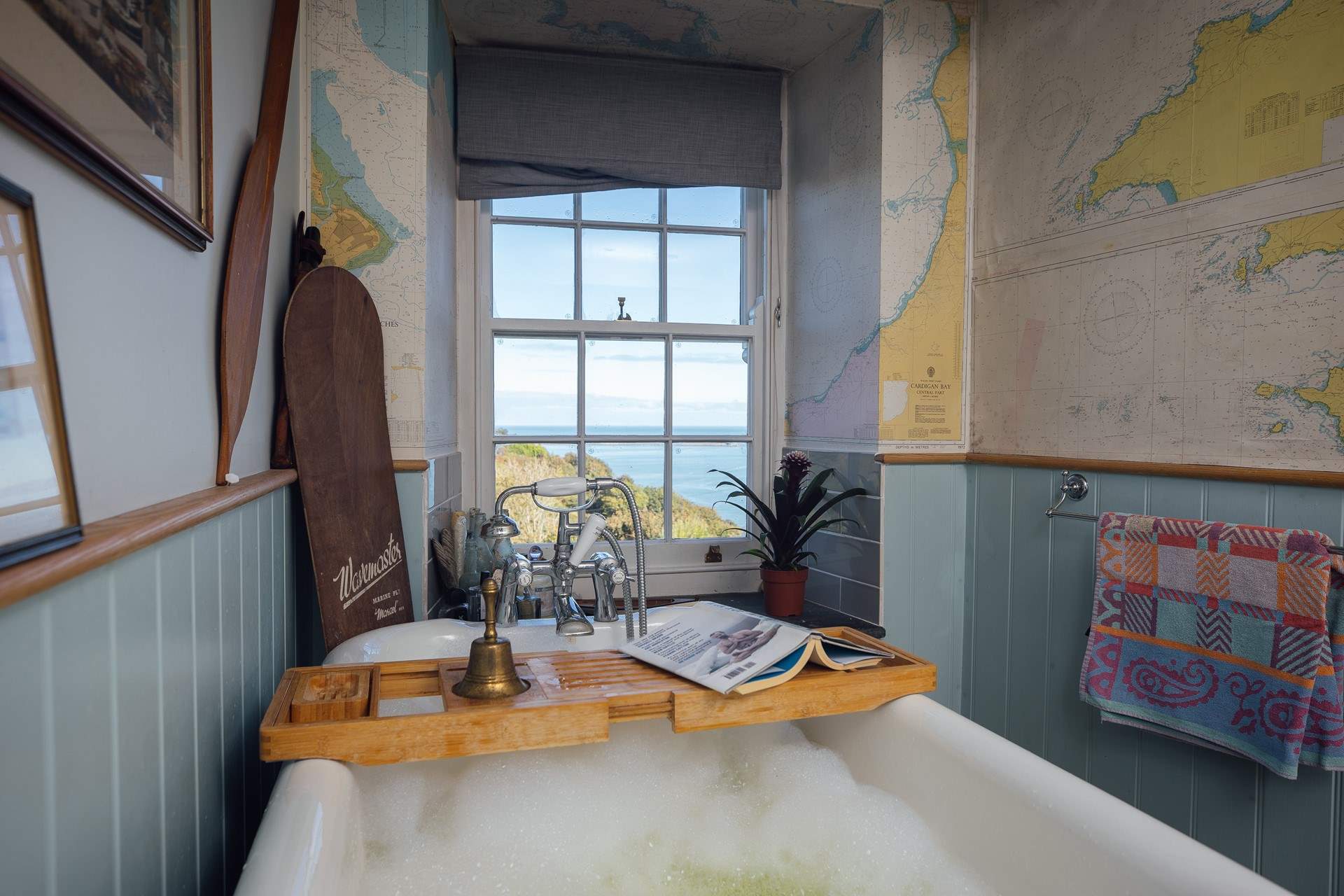 Soak in the bath and take in the views from the ground floor bathroom. 