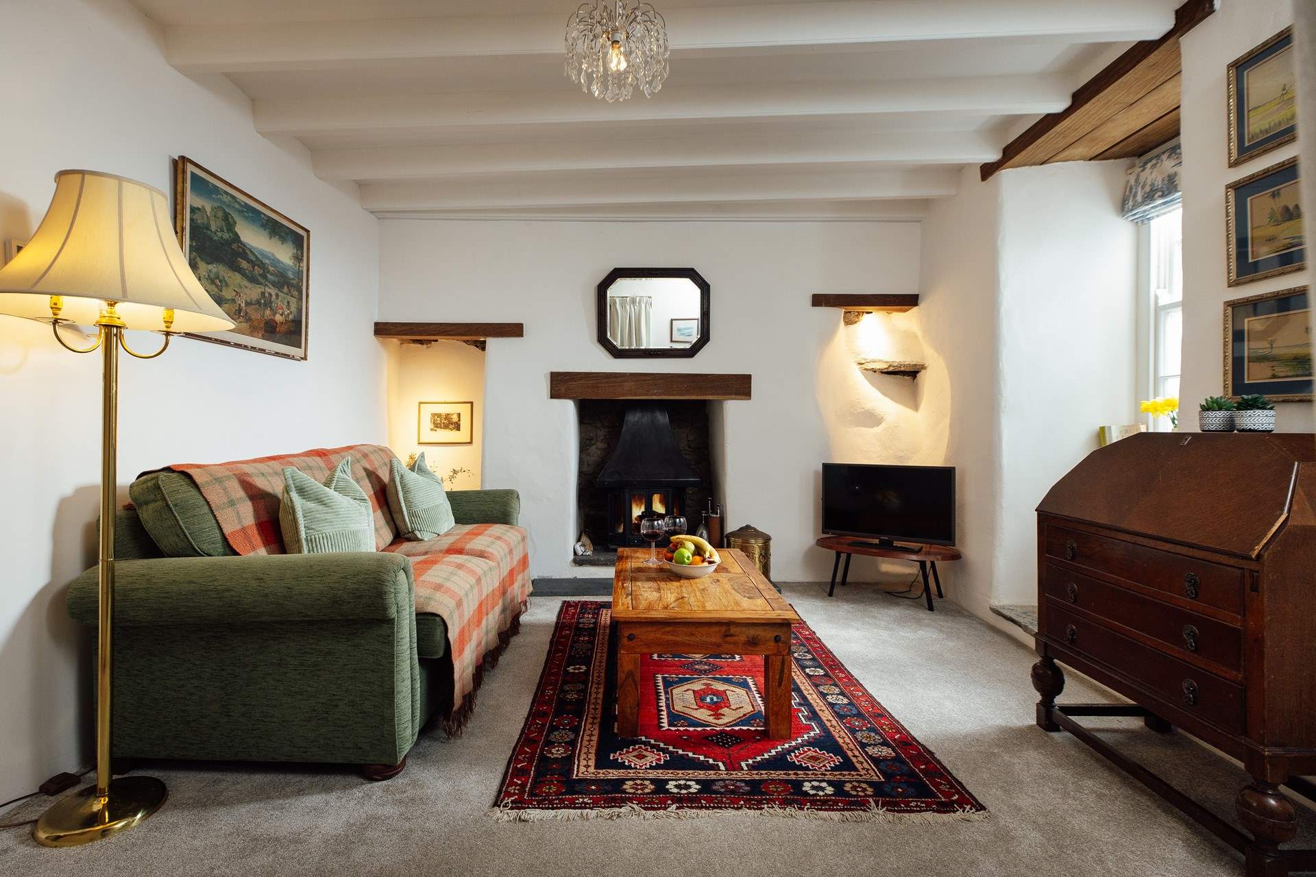 Ty Rhos offers versatile accommodation incorporating a separate second sitting-room, fifth bedroom, shower-room, kitchen and utility-room on the lower ground floor, accessed from the house and car parking area. 