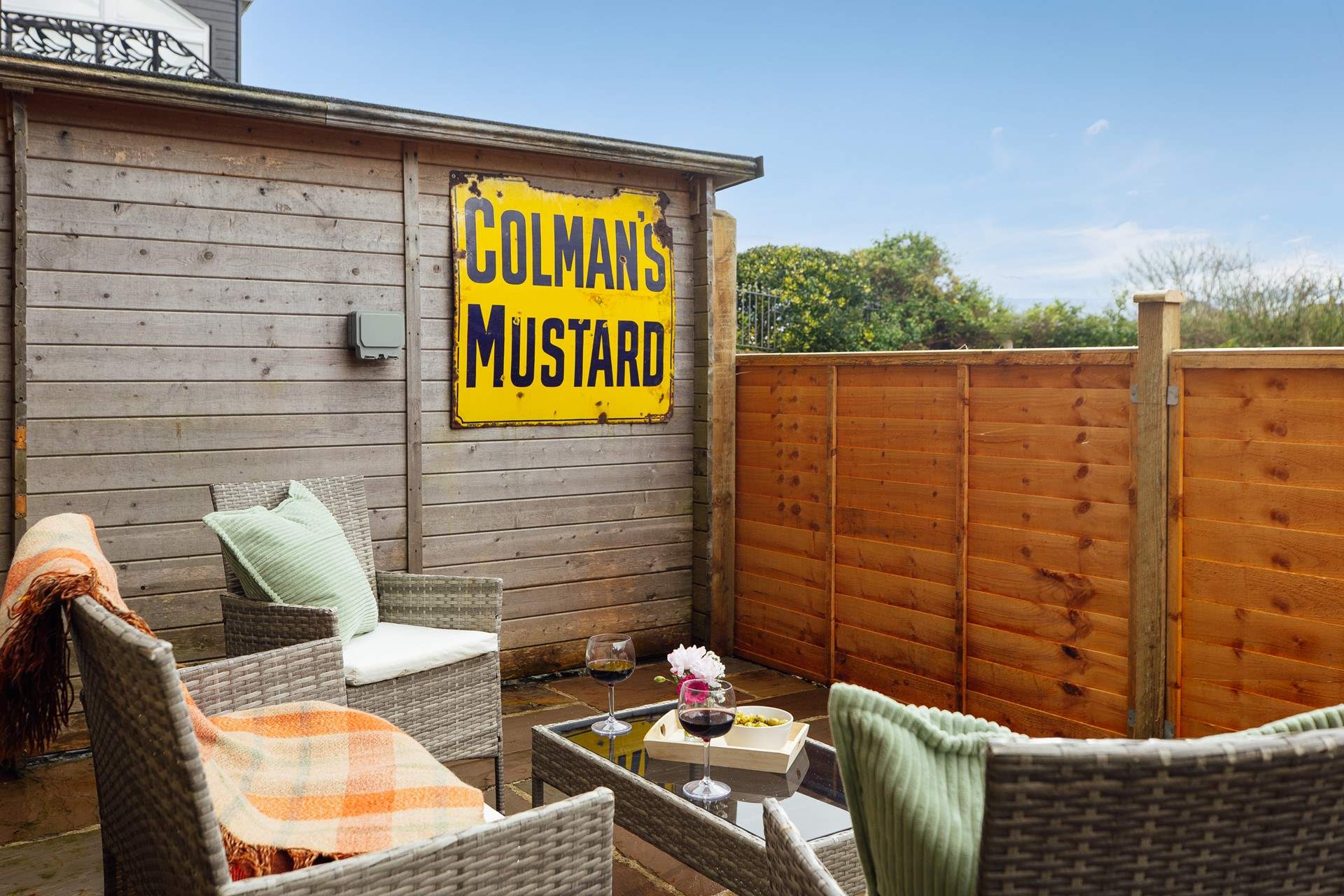Relax in the sunshine on the private patio, via which the lower ground level incorporating a sitting-room. double room, shower-room and utility-room may be accessed without using the stairs. 