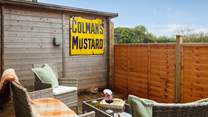 Relax in the sunshine on the private patio, via which the lower ground level incorporating a sitting-room. double room, shower-room and utility-room may be accessed without using the stairs. 