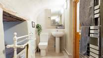 Enjoy some holiday pampering in the lower ground shower-room. 