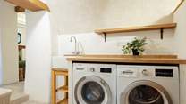 Very useful utility-room on the lower ground level. 