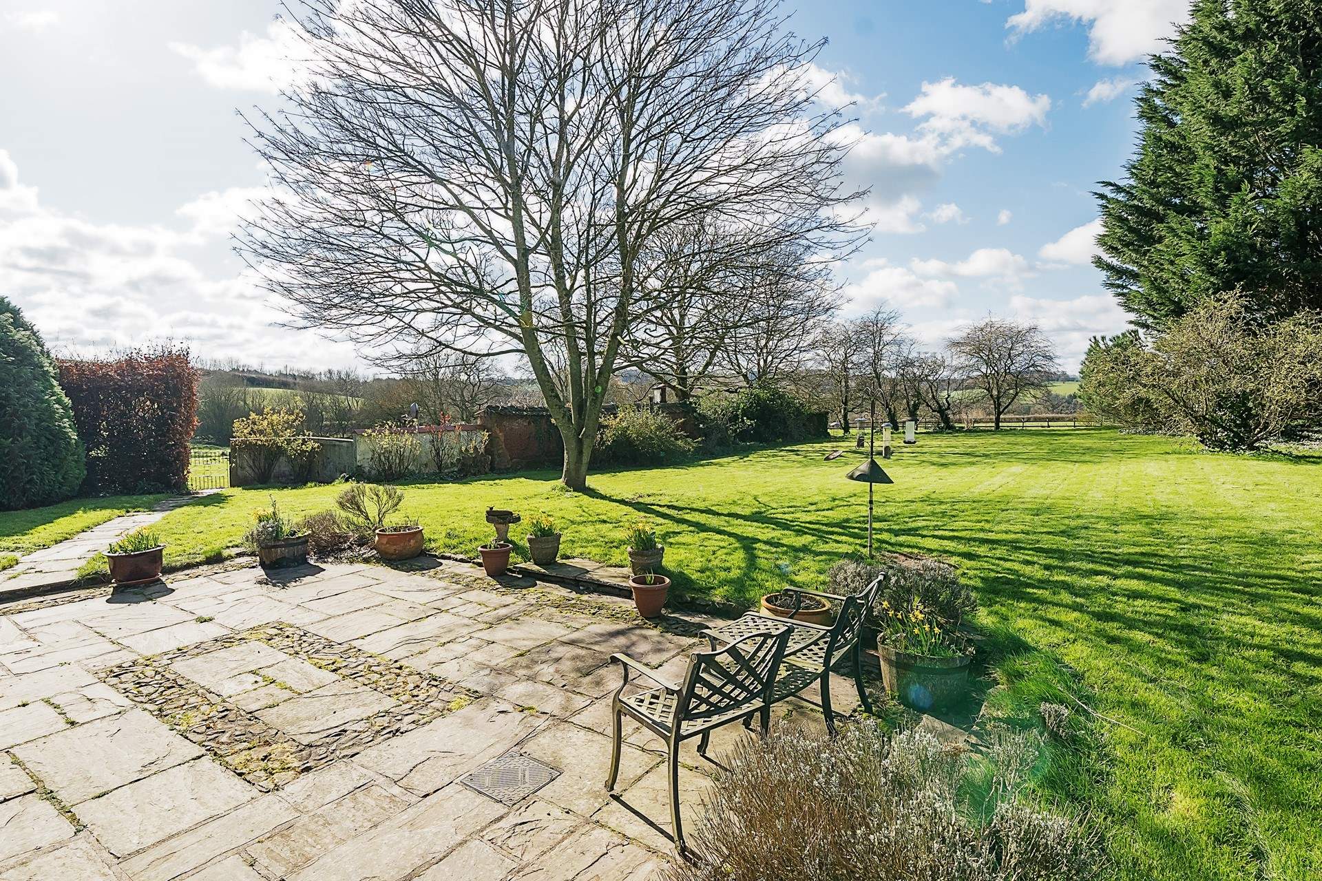 Even on a cool winter's day the glorious garden and lawn area looks super inviting.