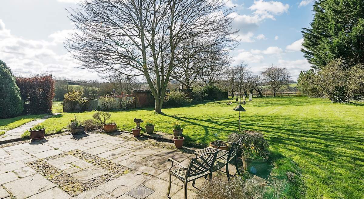 Even on a cool winter's day the glorious garden and lawn area looks super inviting.