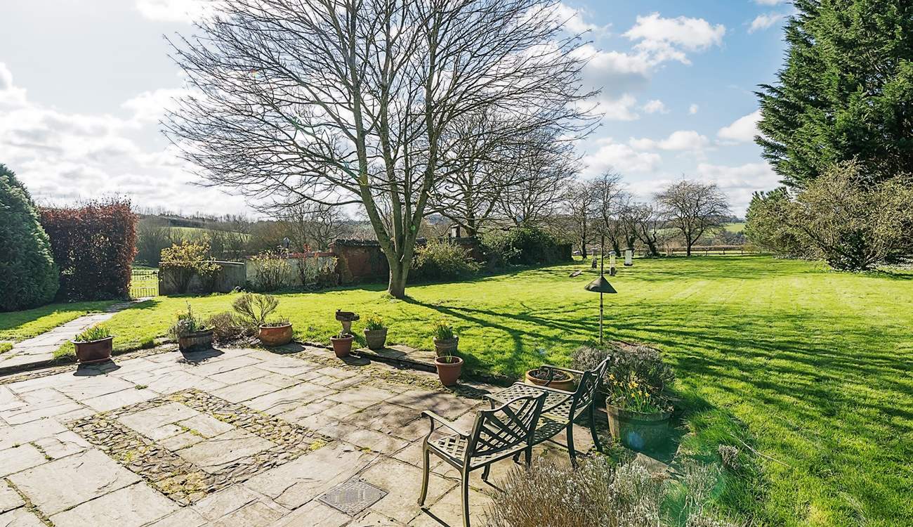 Even on a cool winter's day the glorious garden and lawn area looks super inviting.