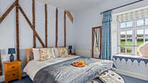 Bedroom 3 is home to a king-size bed and is beautifully finished.