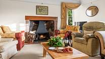 Another cosy sitting-room, fully furnished with another wood-burner for those chillier evenings.