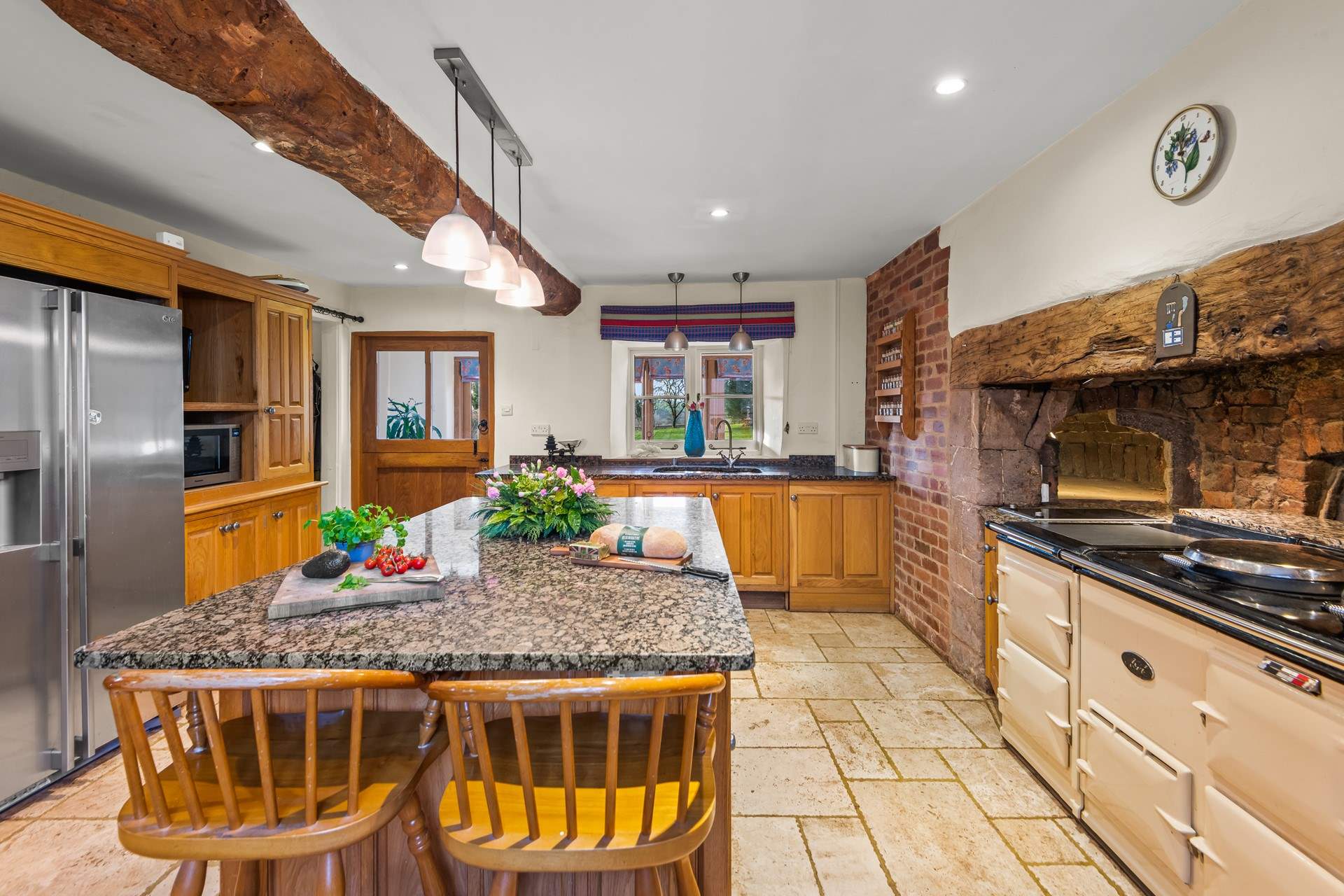 The kitchen leads into the conservatory and the very handy utility-room beyond.