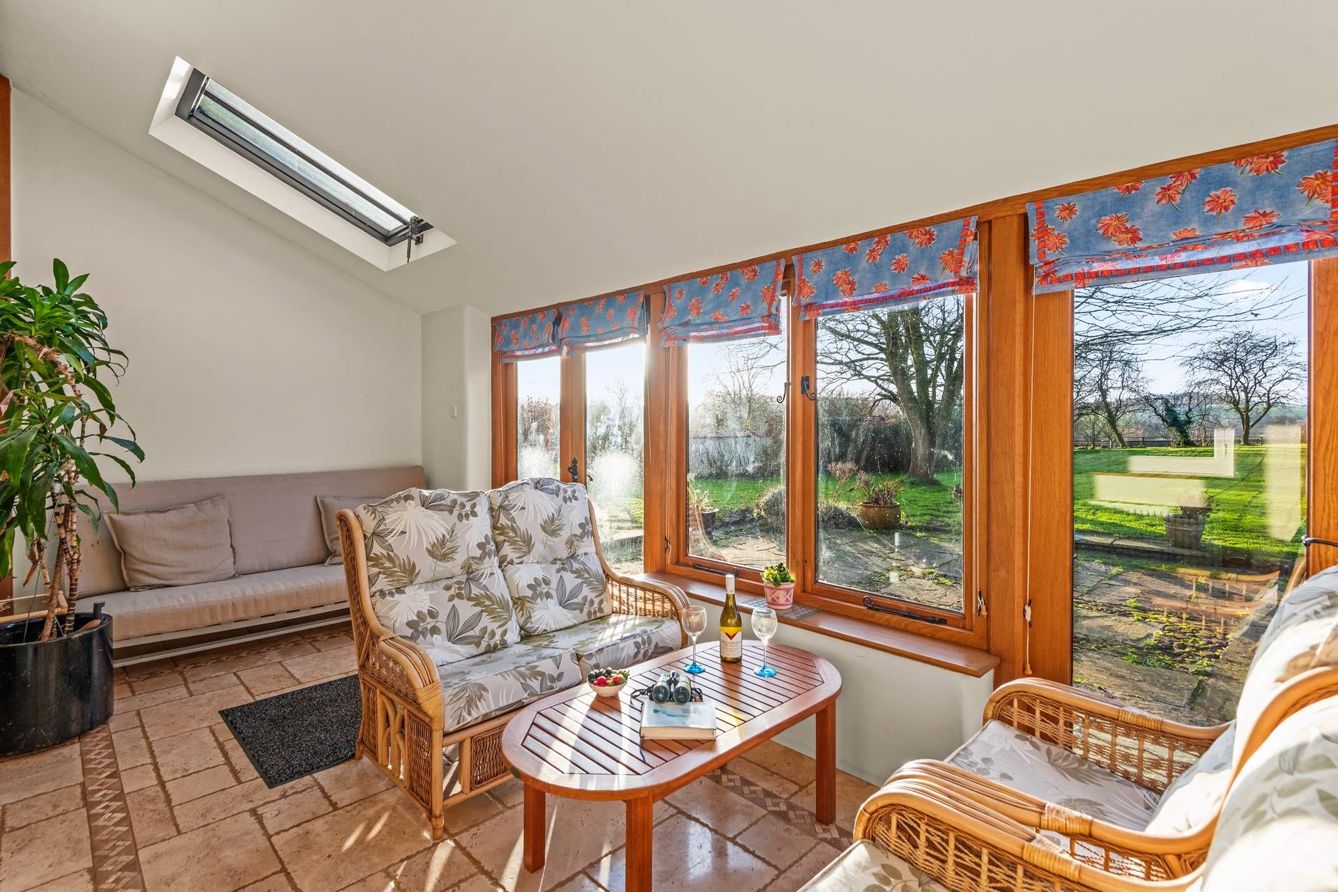 Plentiful seating in the super bright and airy conservatory.