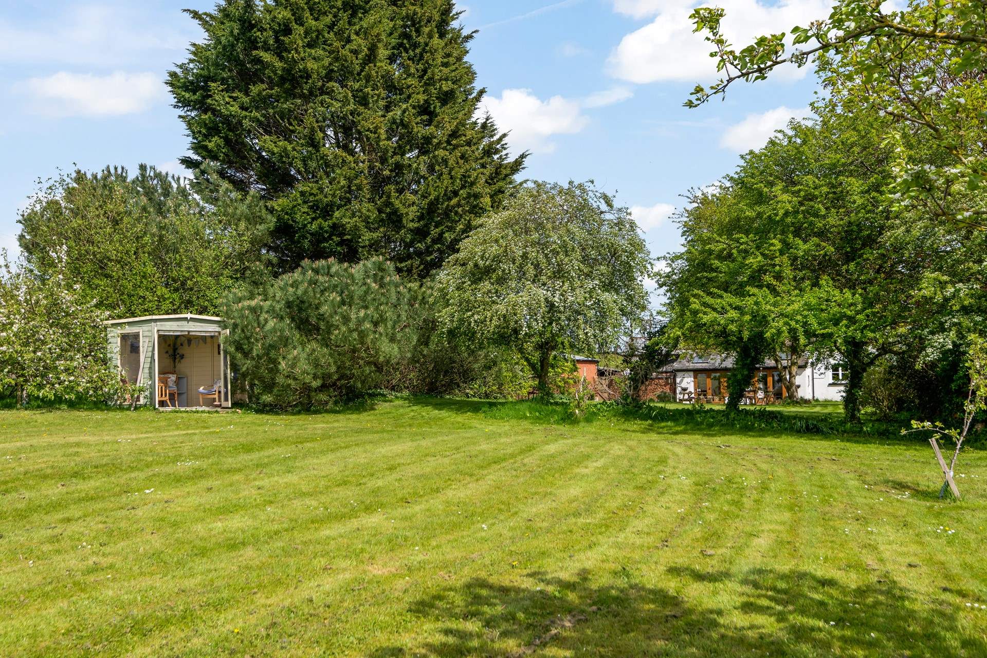 Sit a while in the summer house and enjoy the peace and quiet your surroundings offer.
