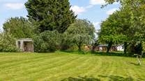 Sit a while in the summer house and enjoy the peace and quiet your surroundings offer.