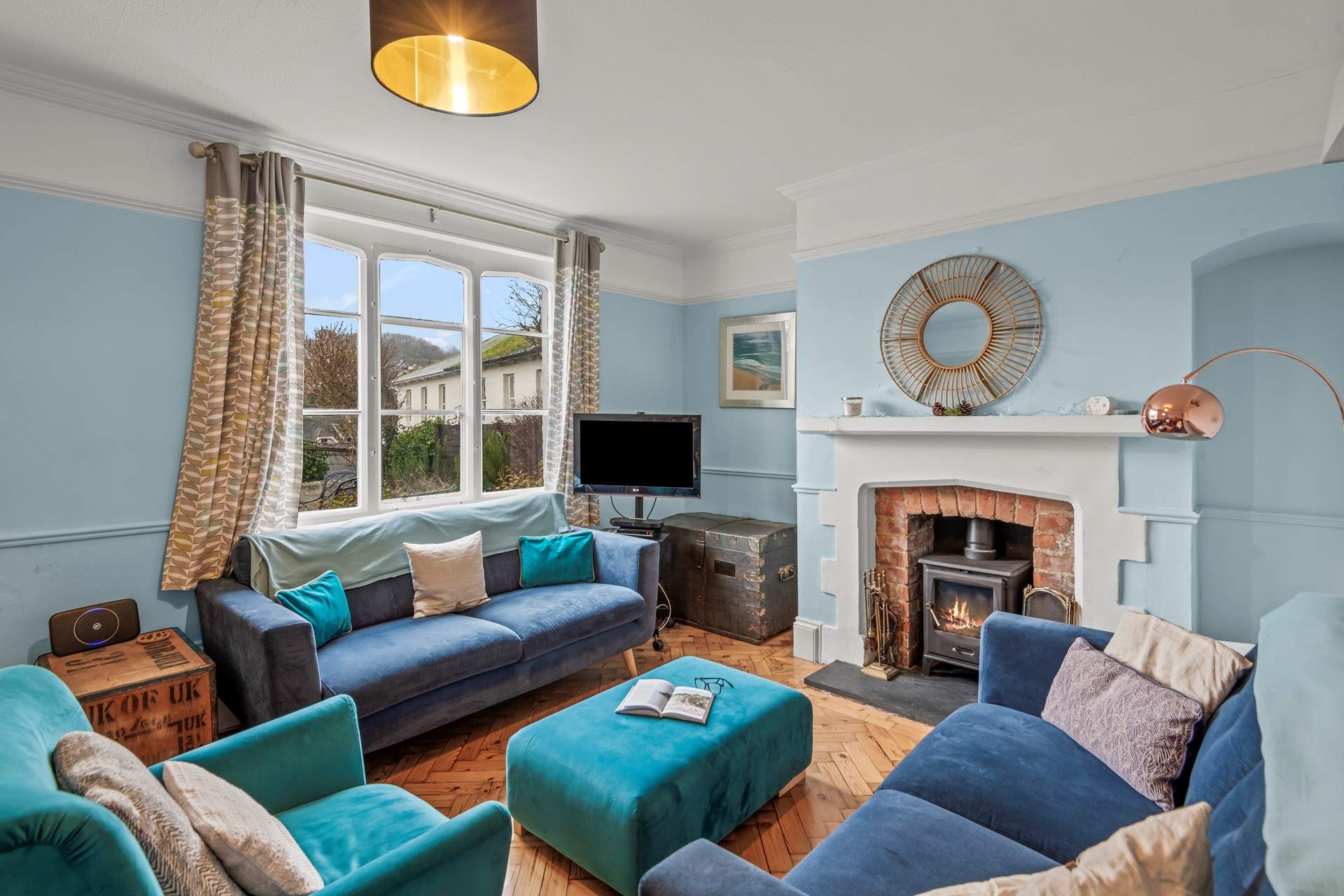 The living area is such a cosy space to cuddle up and relax in.