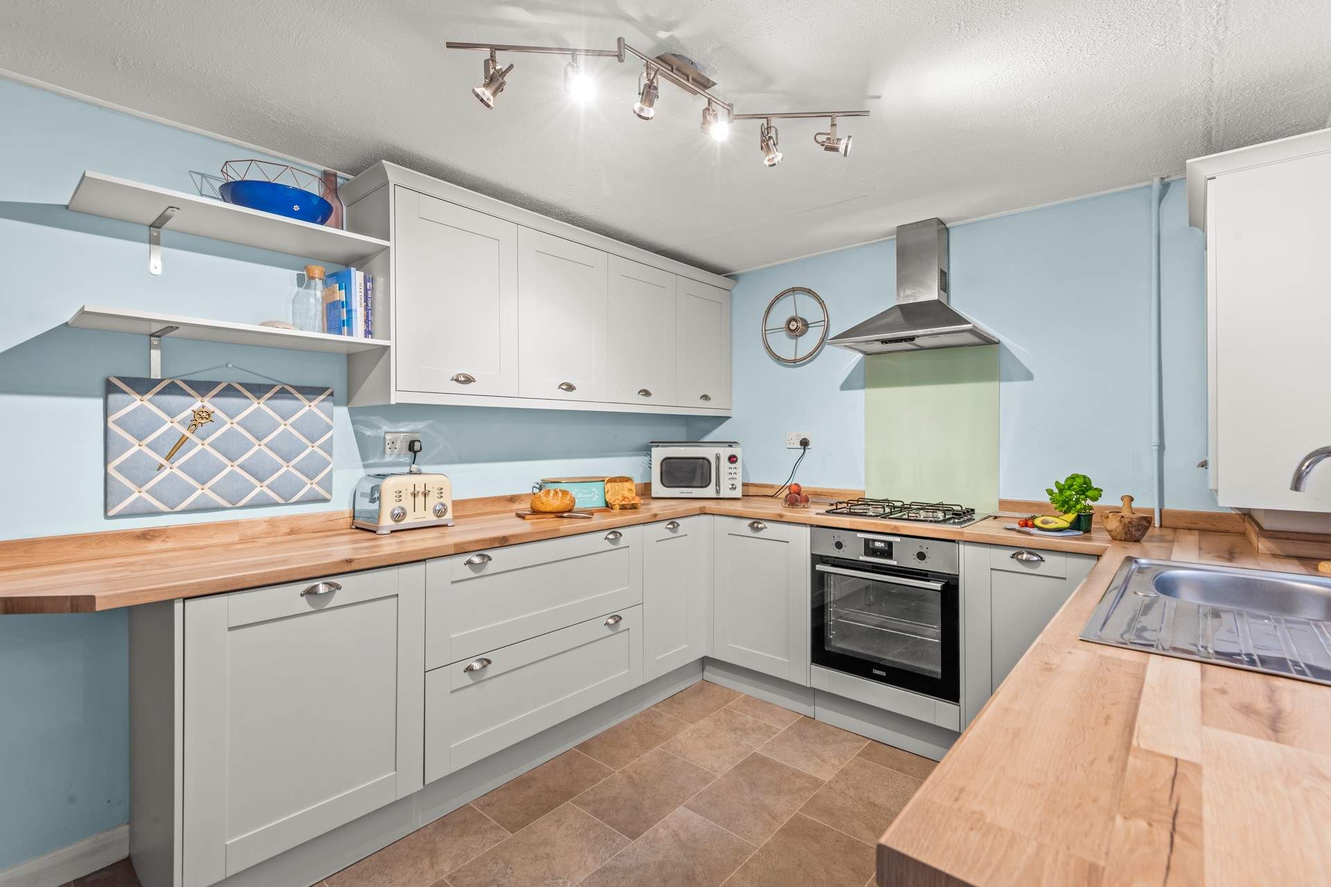 Whipping up a feast in this spacious kitchen is a treat for any chef.