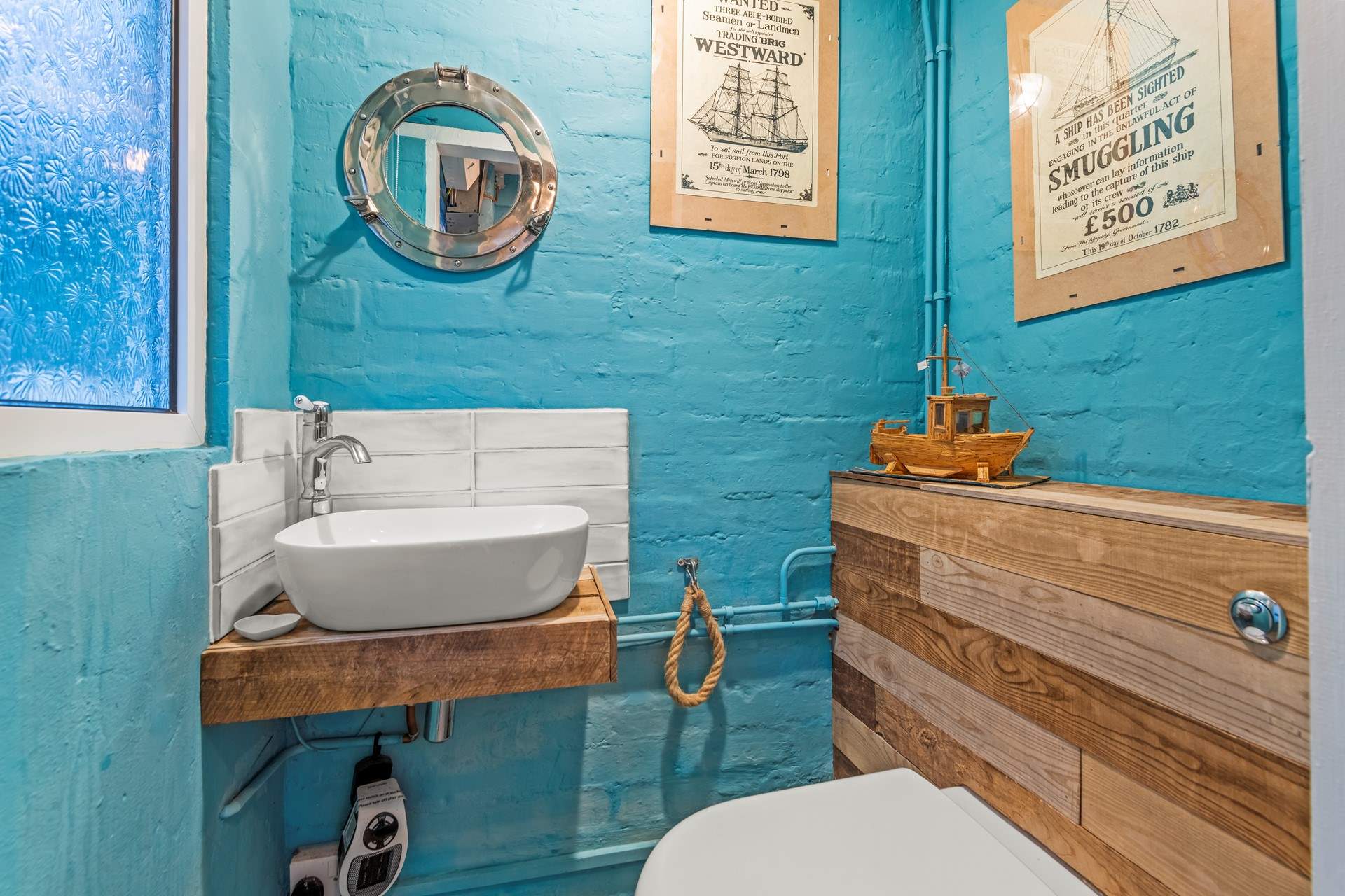 The bright and cheery cloakroom on the ground floor.