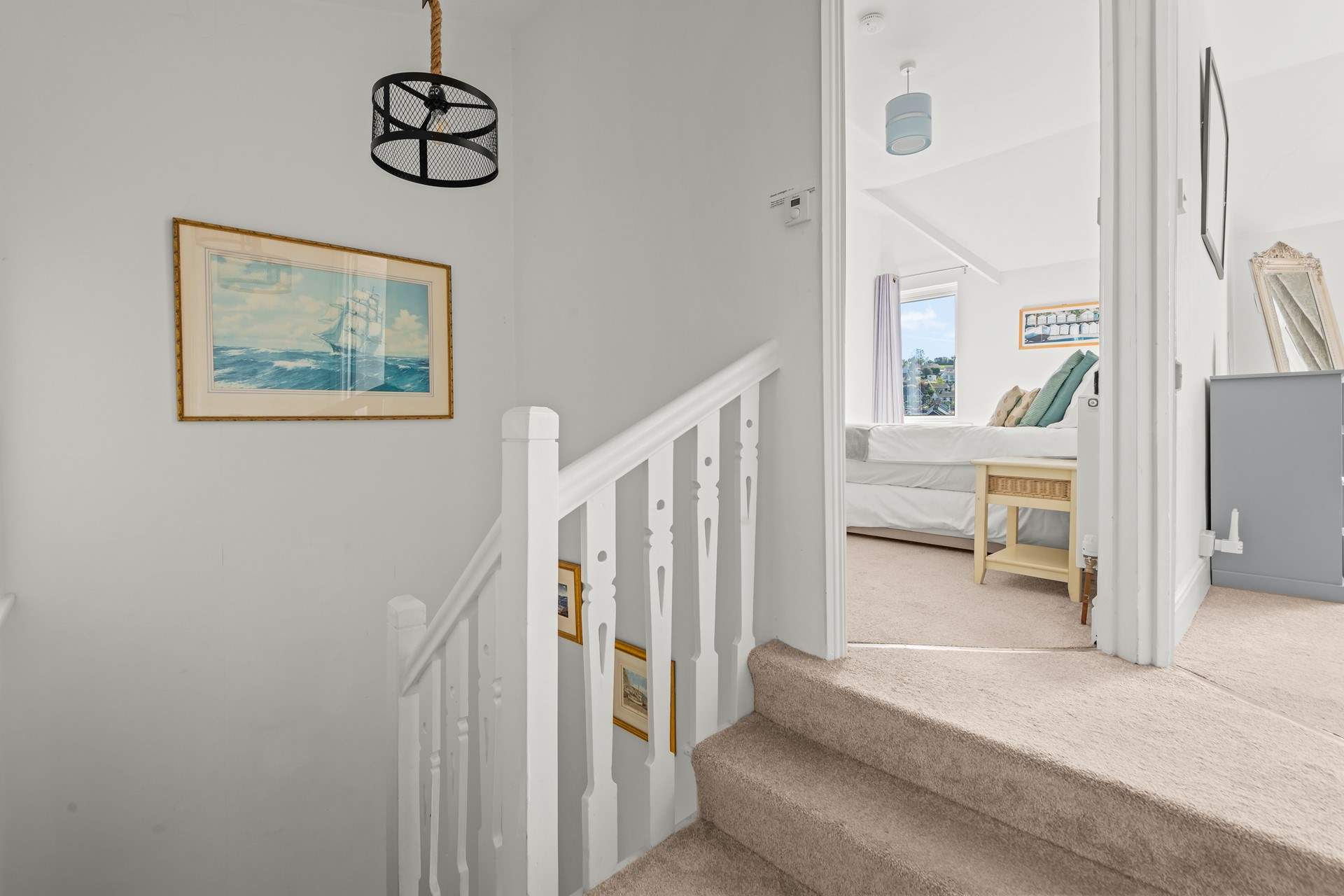Heading upstairs to the bedrooms.