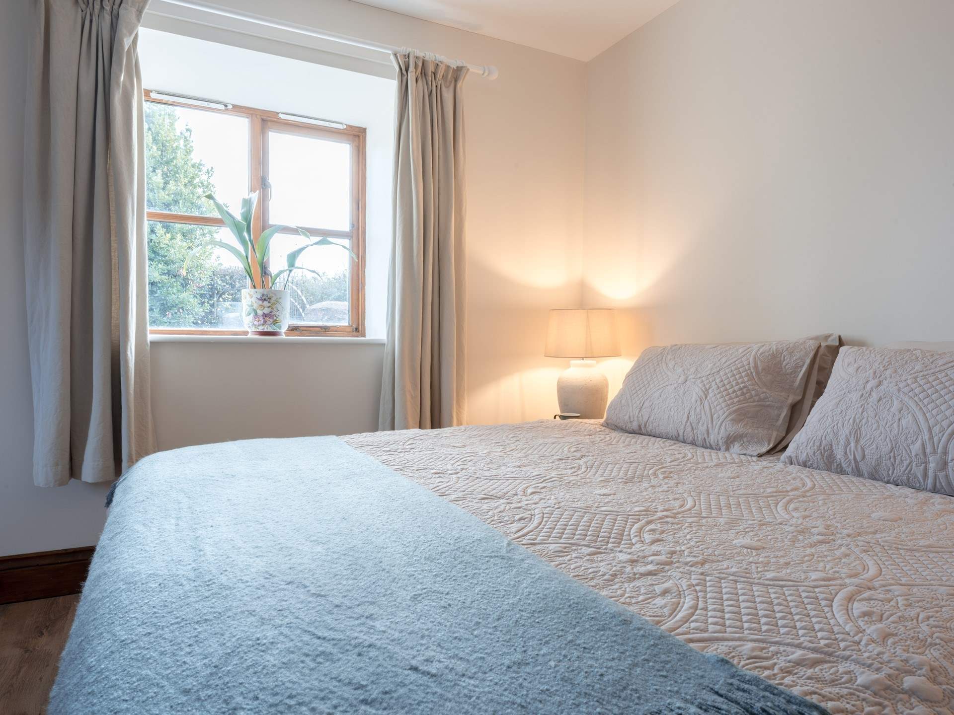 The primary bedroom is such a haven of calm and quiet with a very tempting super-king size bed (can be split into two singles). Late starts may be likely!