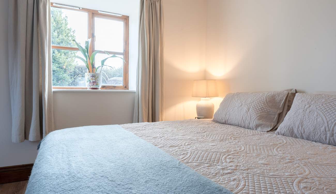 The primary bedroom is such a haven of calm and quiet with a very tempting super-king size bed (can be split into two singles). Late starts may be likely!