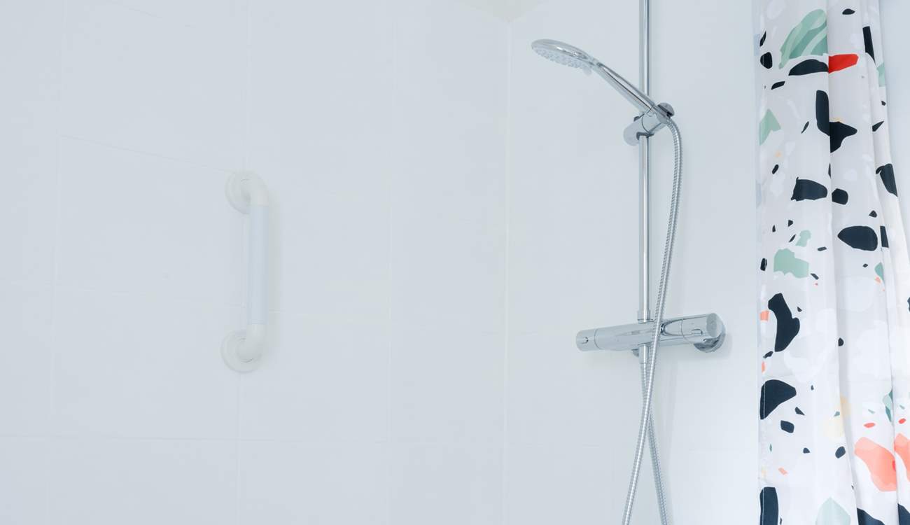 A wonderful rainfall shower and deep bath await to ease any achy legs after a day exploring.