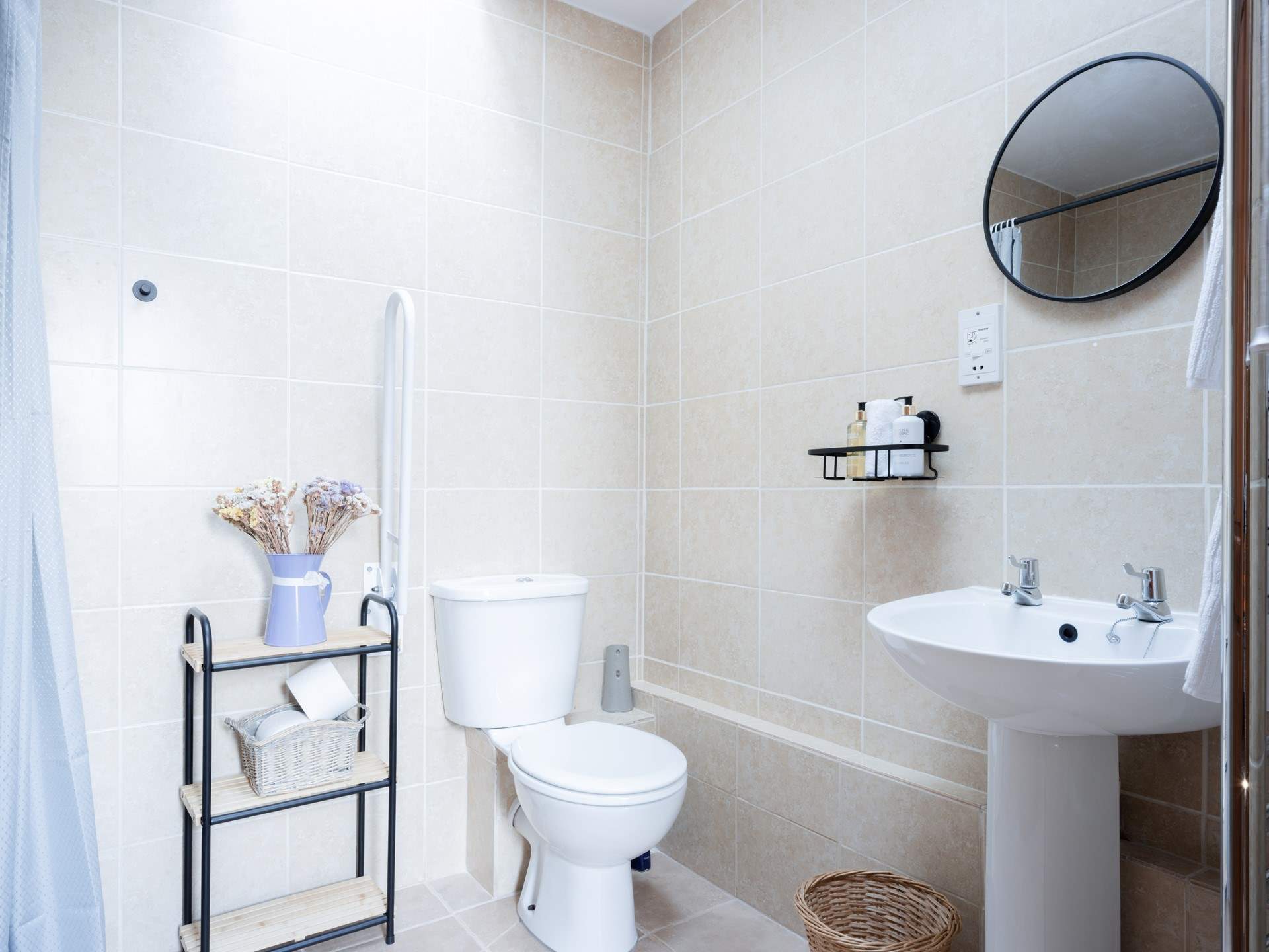 The main shower-room is very accessible with a large wet-room shower enclosure. The skylight lets the natural light pour in.