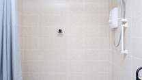 So much space on offer in the wet-room. A shower chair is also available on request.