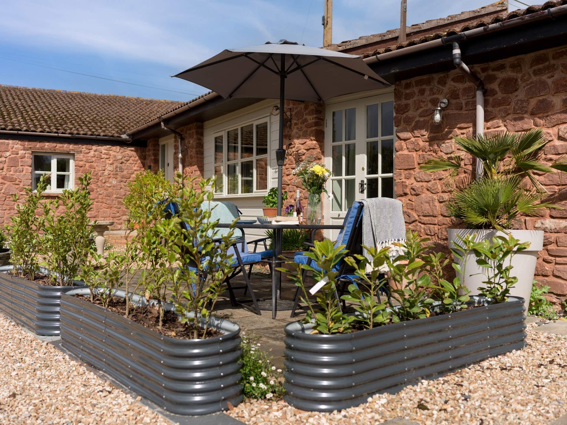 The outdoor seating area is a wonderful & peaceful suntrap.