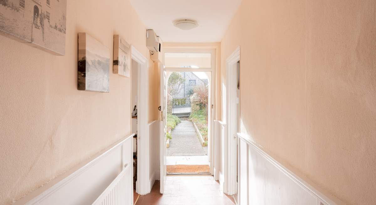 The central hallway links all the rooms together.