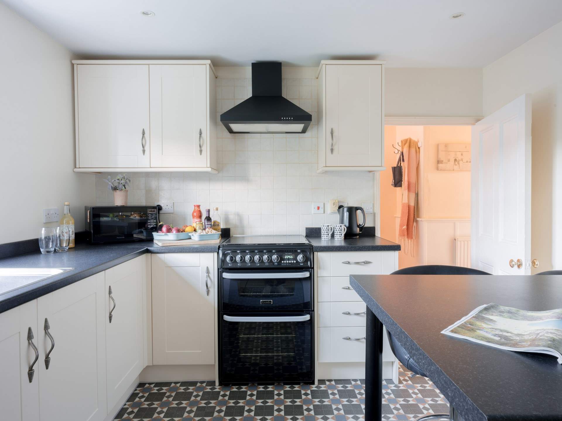 The kitchen sits to the back of the house overlooking the back garden.