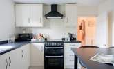 The kitchen sits to the back of the house overlooking the back garden. - Thumbnail Image