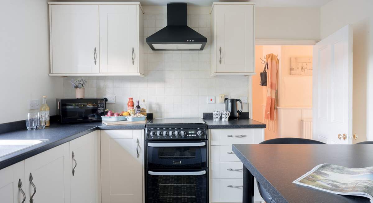 The kitchen sits to the back of the house overlooking the back garden.