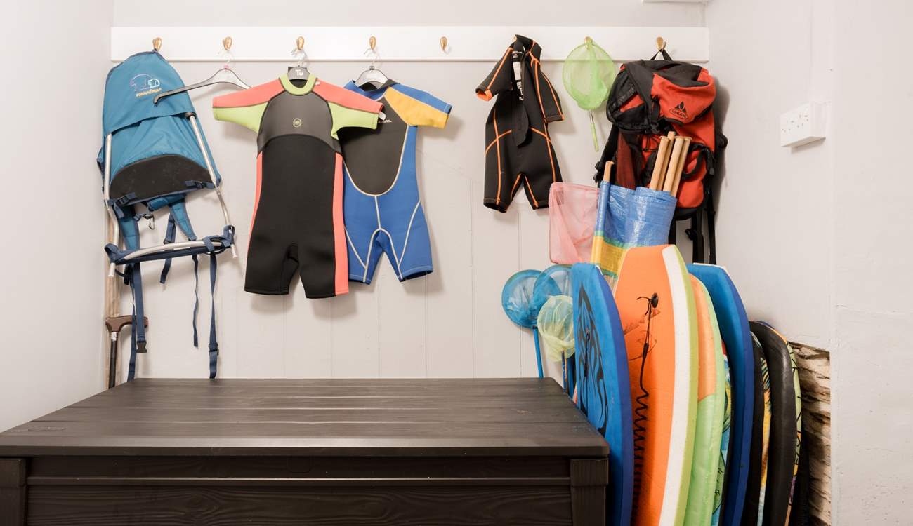 When it's time to head to the beach you'll find plenty of beach gear stored at the back of the house.