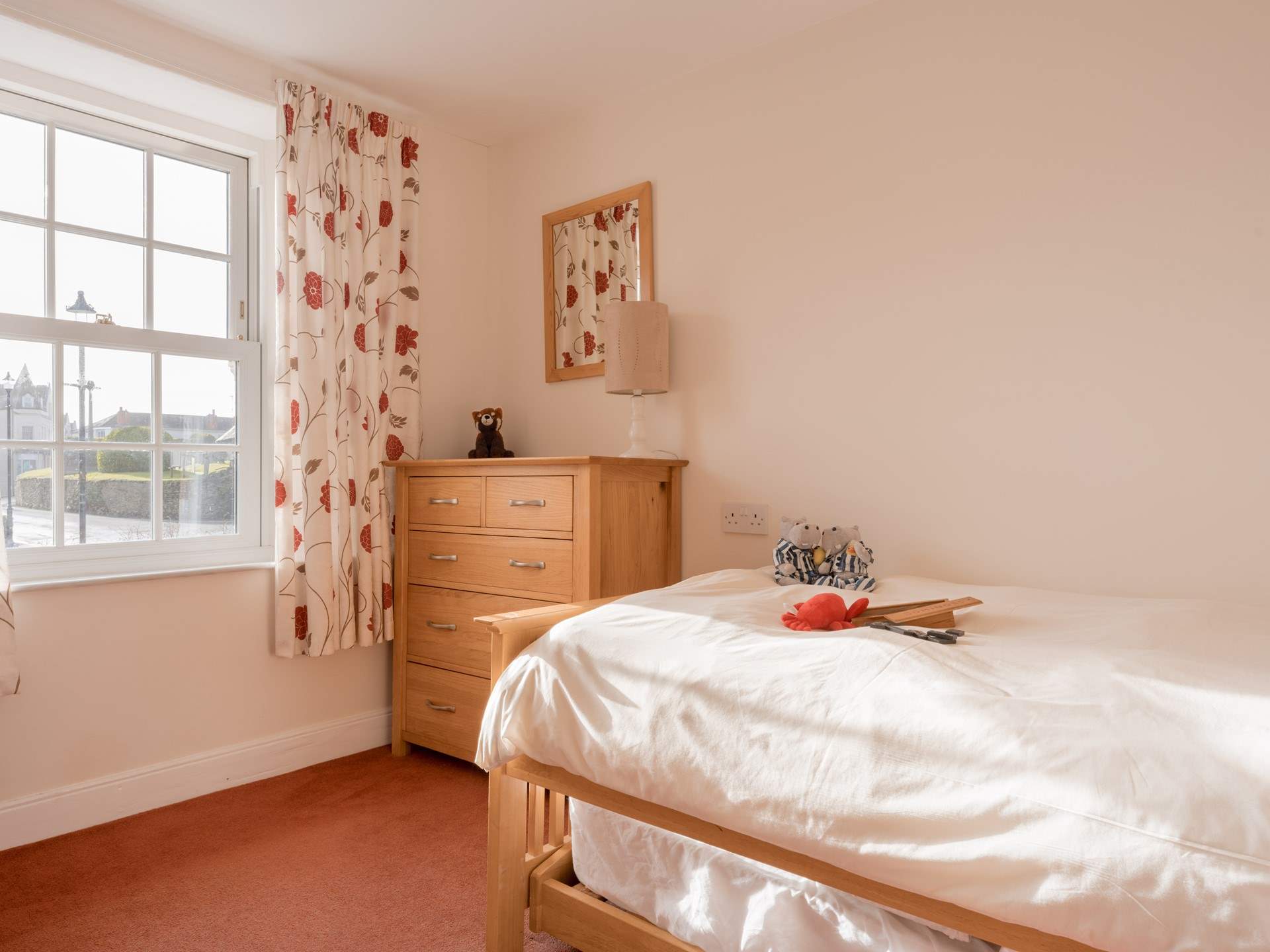 This single room is another lovely, bright room. 