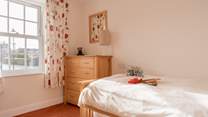 This single room is another lovely, bright room. 