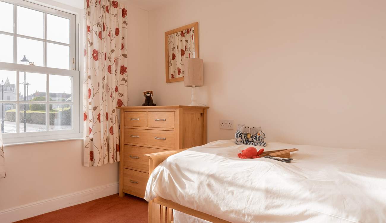 This single room is another lovely, bright room. 