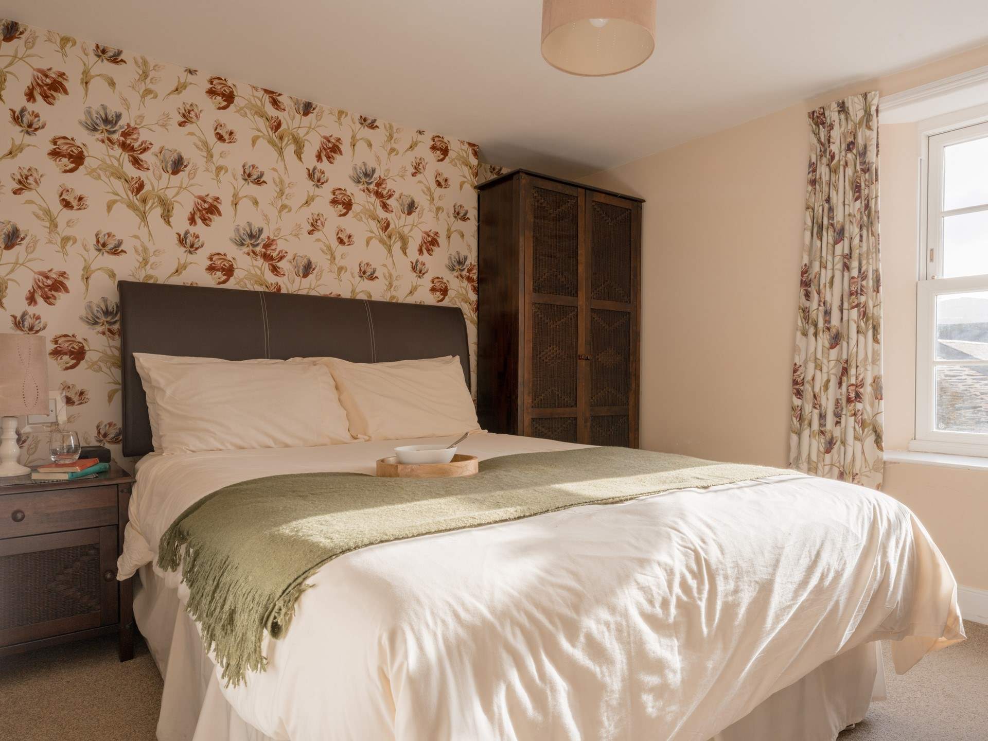 The en suite bedroom looks out over the village.