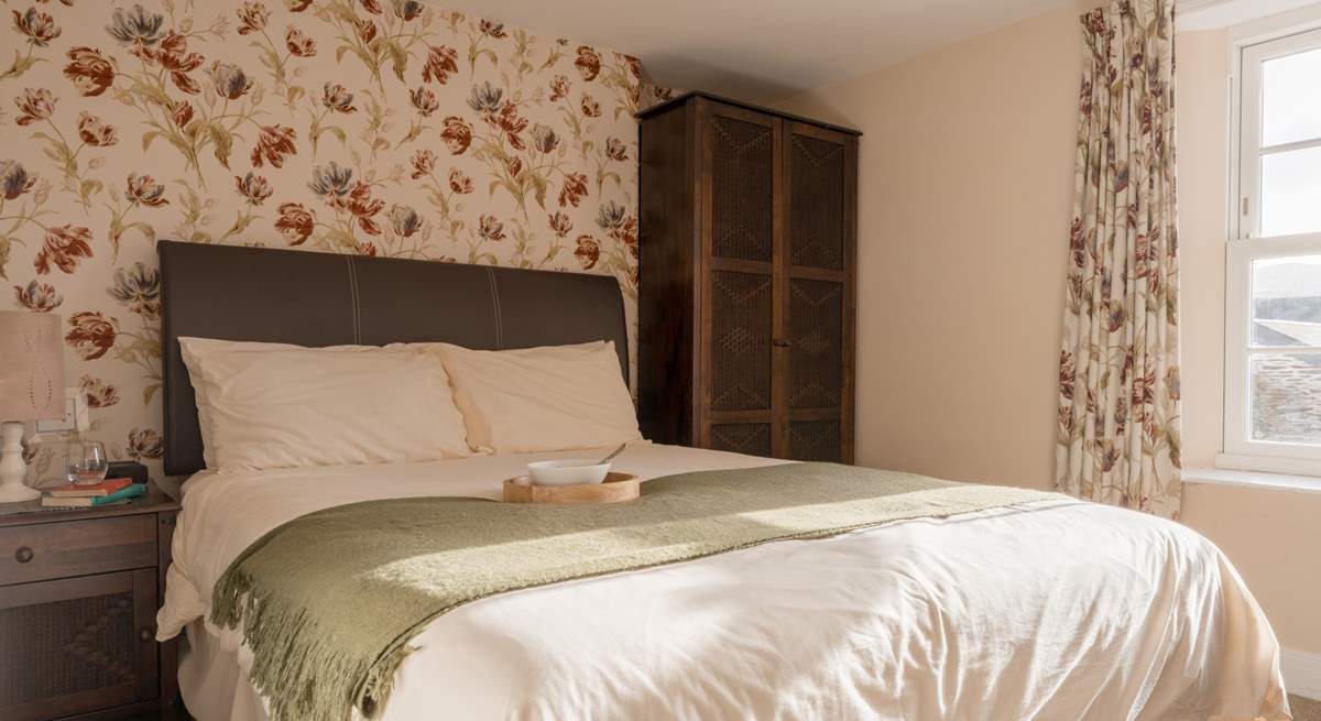 The en suite bedroom looks out over the village.