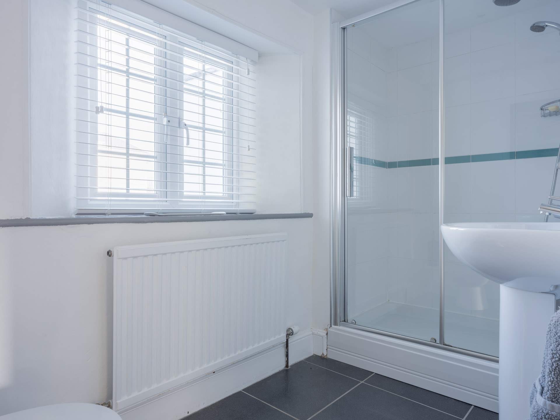 Rinse off those sandy toes in the family shower-room.