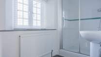 Rinse off those sandy toes in the family shower-room.