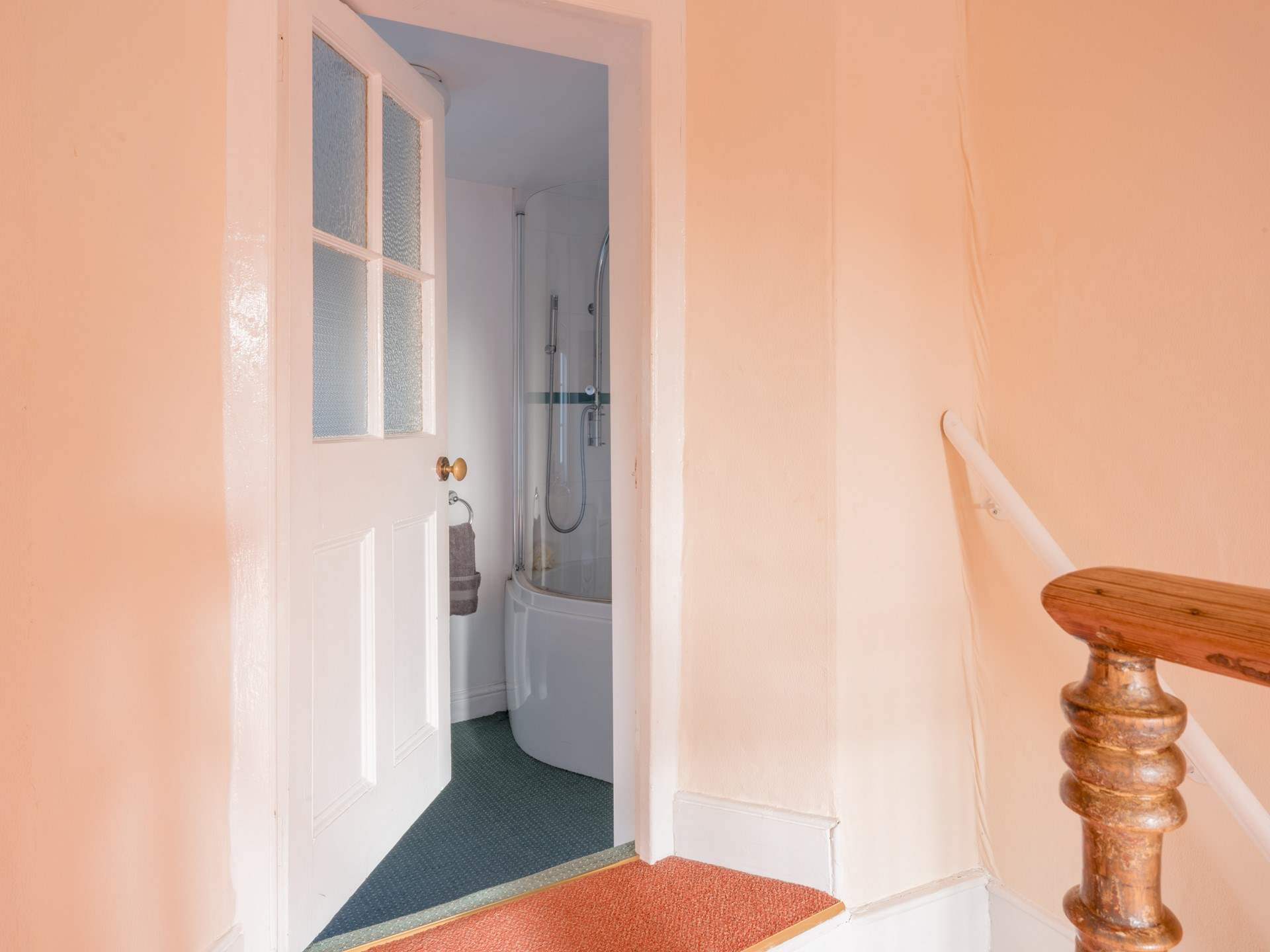 As you climb the stairs you will find the bathroom on the split landing - please take care.