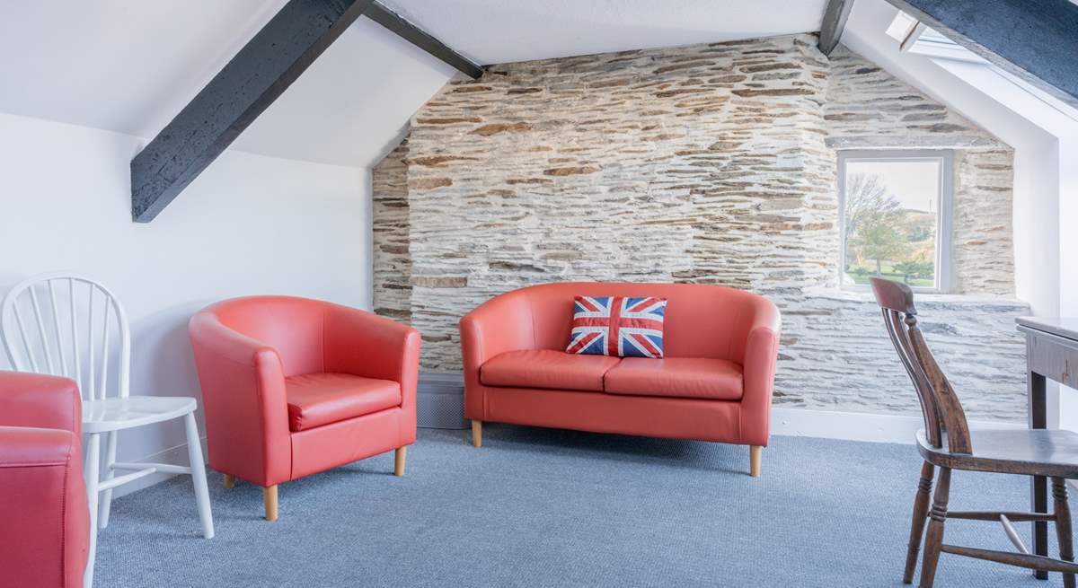 This room provides the perfect spot for a quiet read or catch up on some work.