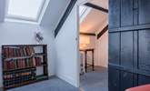 Climb the steep stairs up to the converted attic rooms. - Thumbnail Image